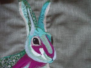An embroidered Cushion Cover